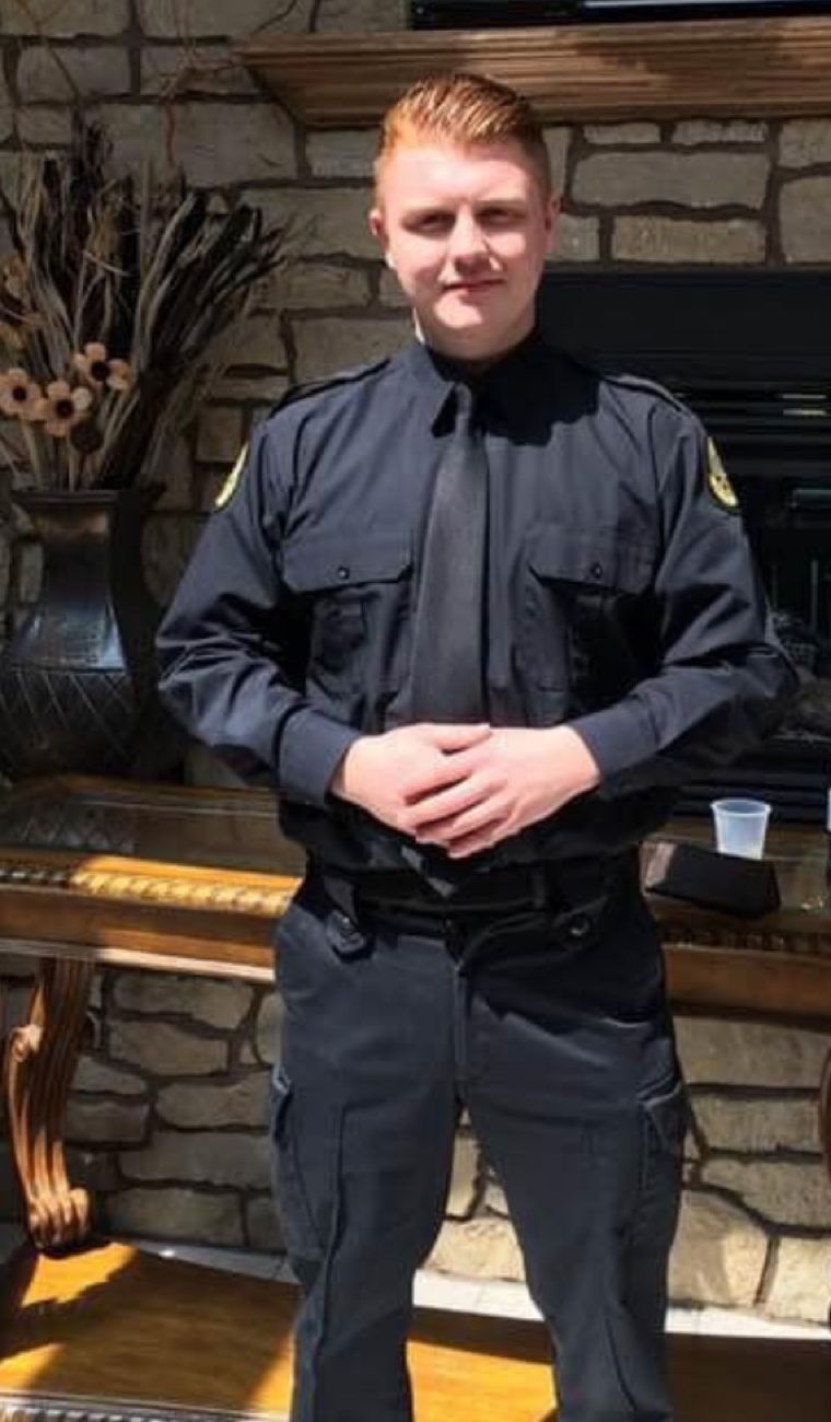 Mitchell Conquer in his correctional officer uniform